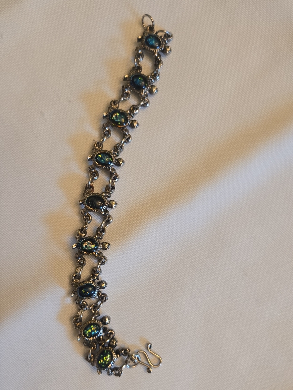 Silver Turtle Link Bracelet with Blue-Green Opal Accents